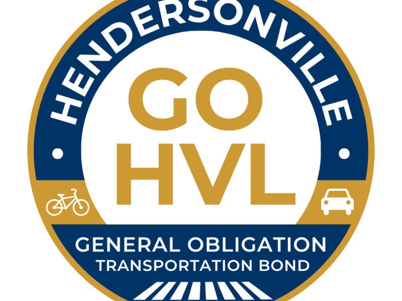 Logo for Hendersonville's transportation bond showing bicycle, crosswalk and car
