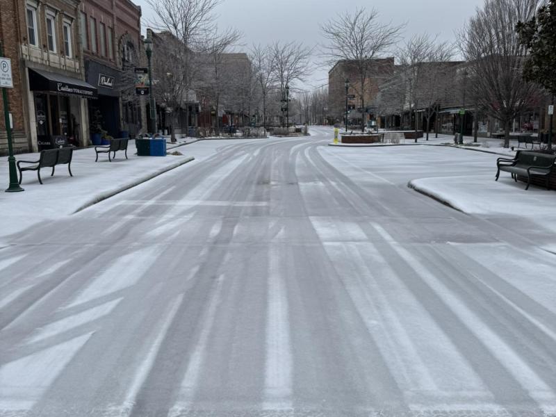 City plowing Main Street during a Winter Storm