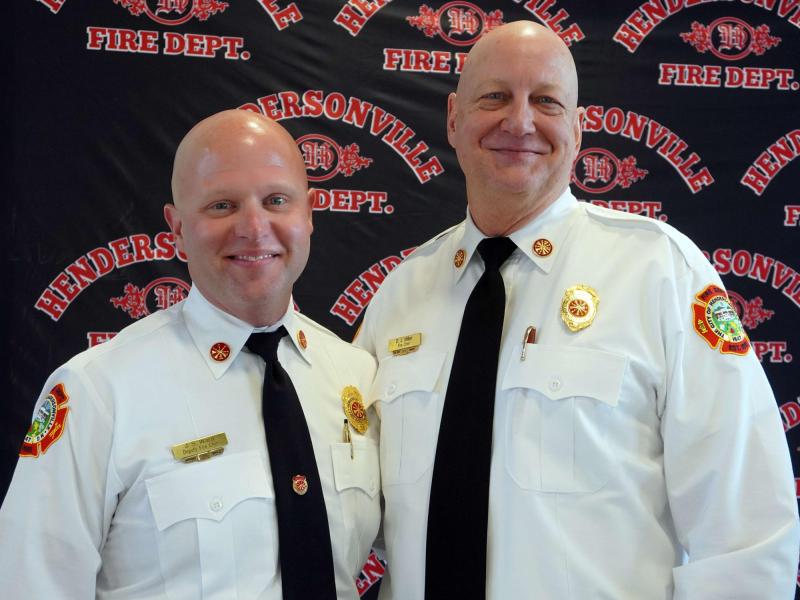 New Chief Ward standing with retiring Chief Miller
