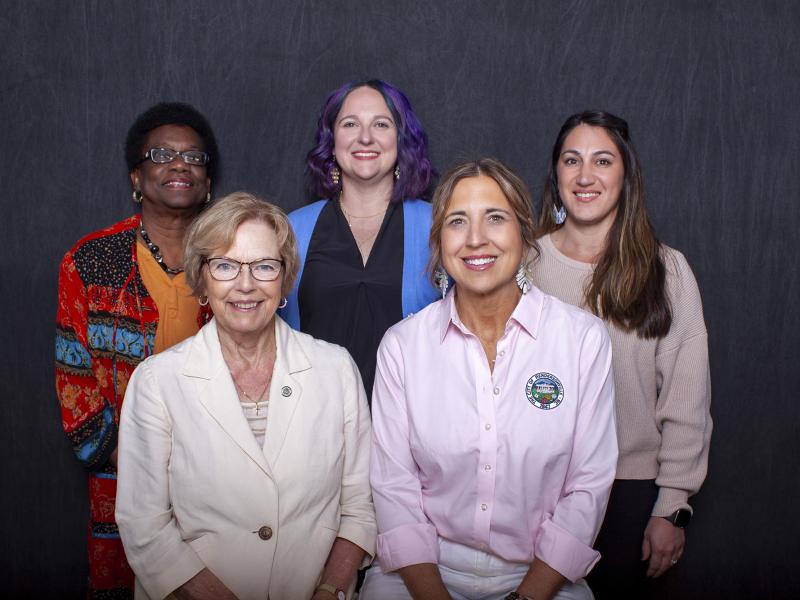 5 smiling city council members