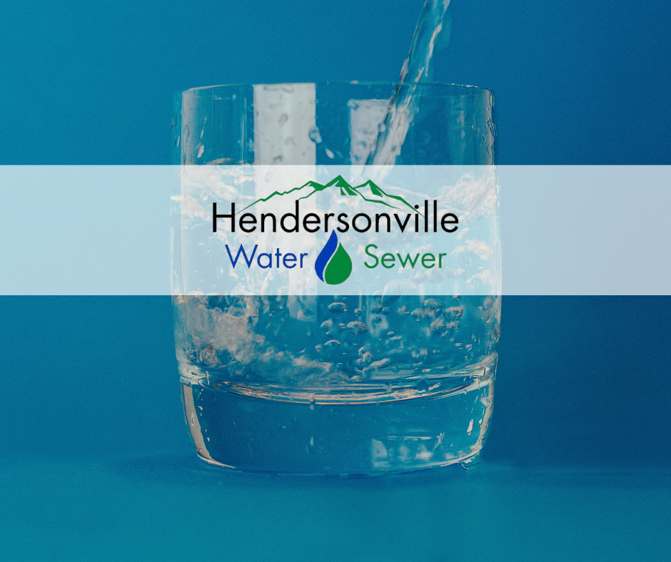 Glass of water with Hendersonville Water and Sewer Logo