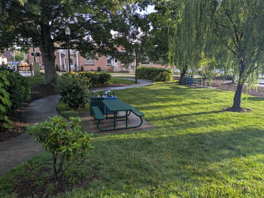 Park bench and walking path at City park