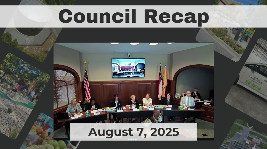 Council Members sitting at dais. 